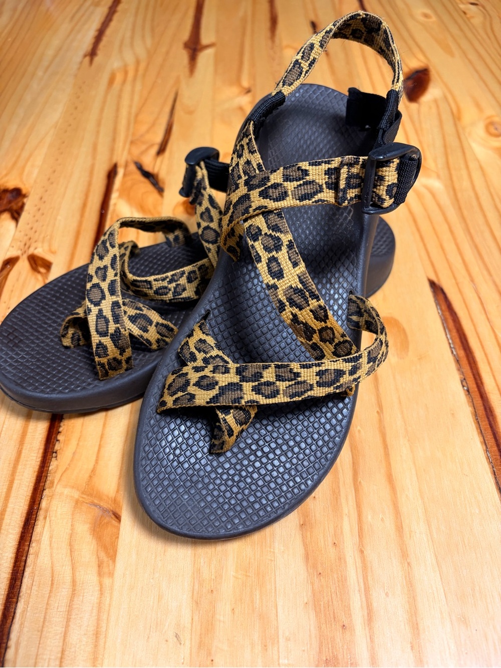 Chaco Leopard Print Strap Sandals in Black and Tan